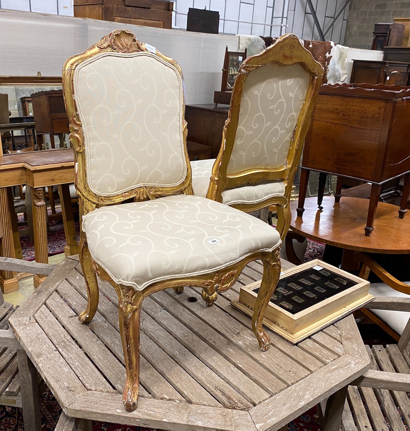 A pair of 19th century French carved giltwood salon chairs, width 54cm, depth 50cm, height 101cm